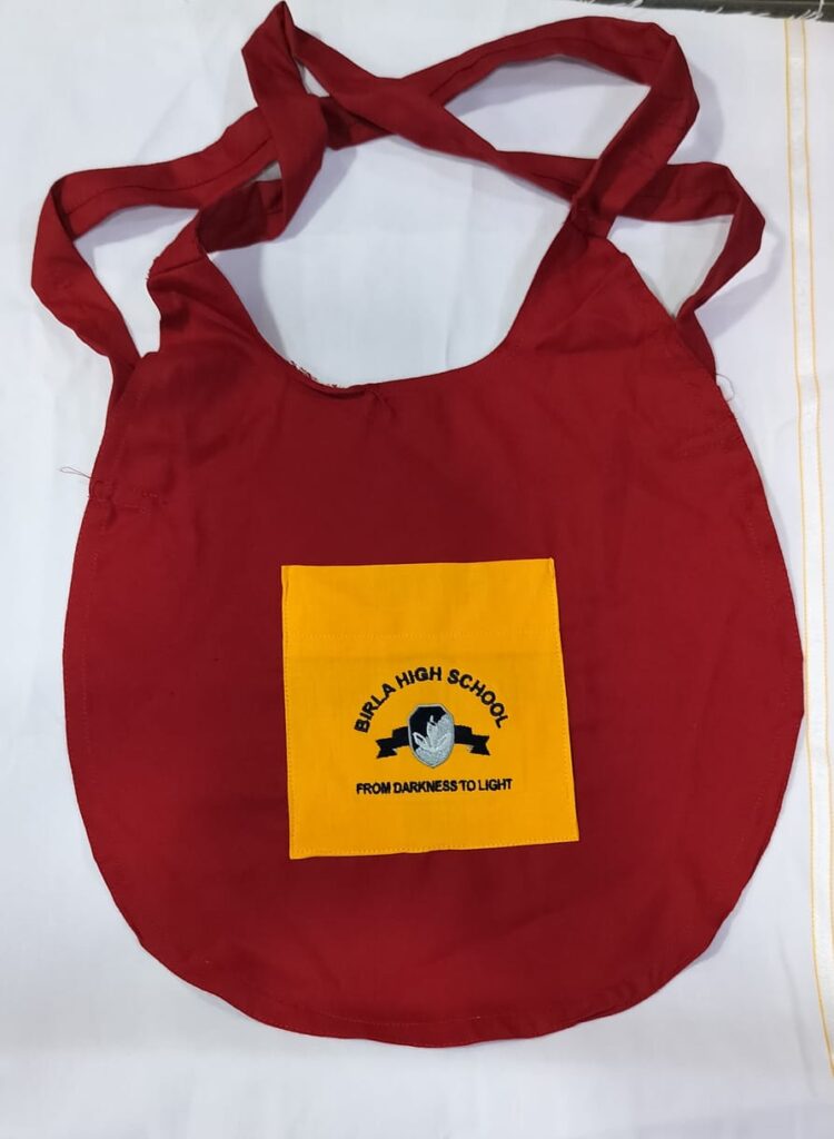 RED APRON FOR UPPER NURSARY HSN Code : 6105 – Scholar'S
